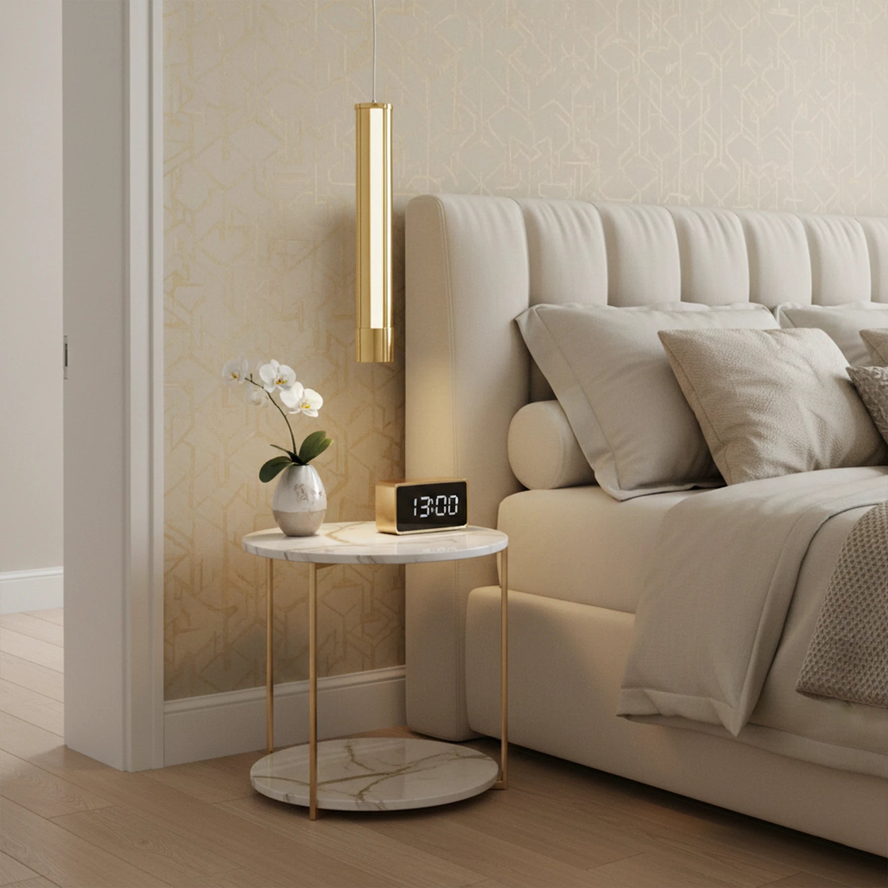 Modern bedroom with a side table, lamp, and bed.