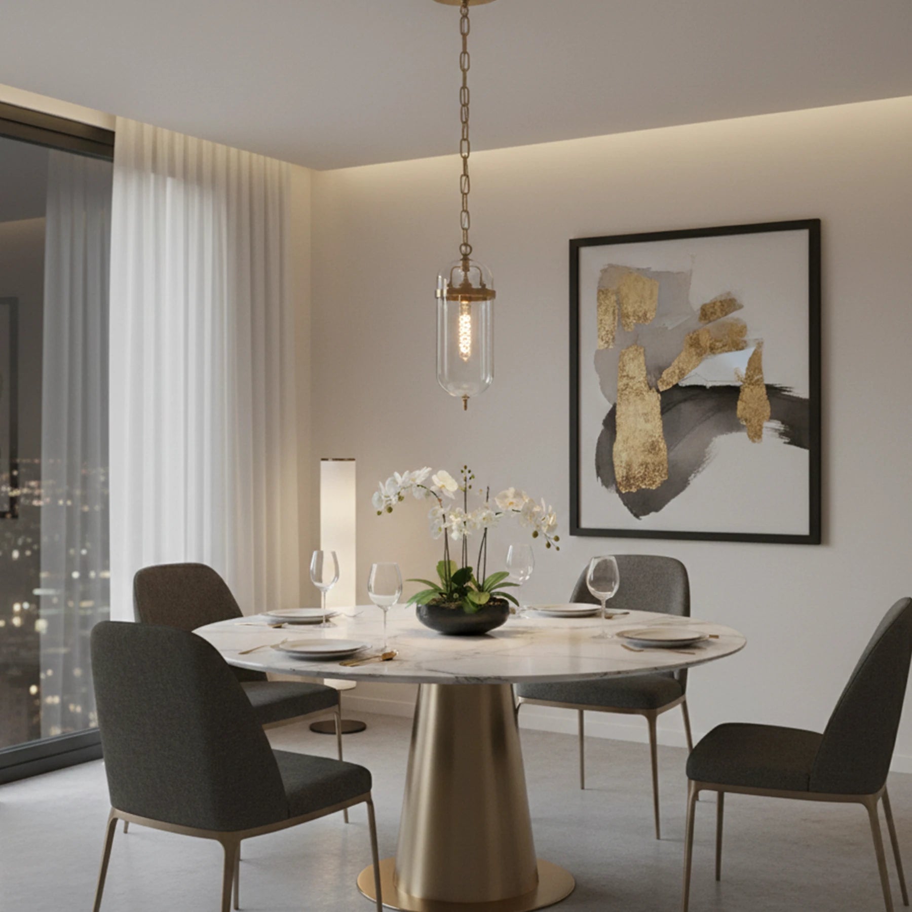 Modern dining room with a round table, chairs, and decorative elements.