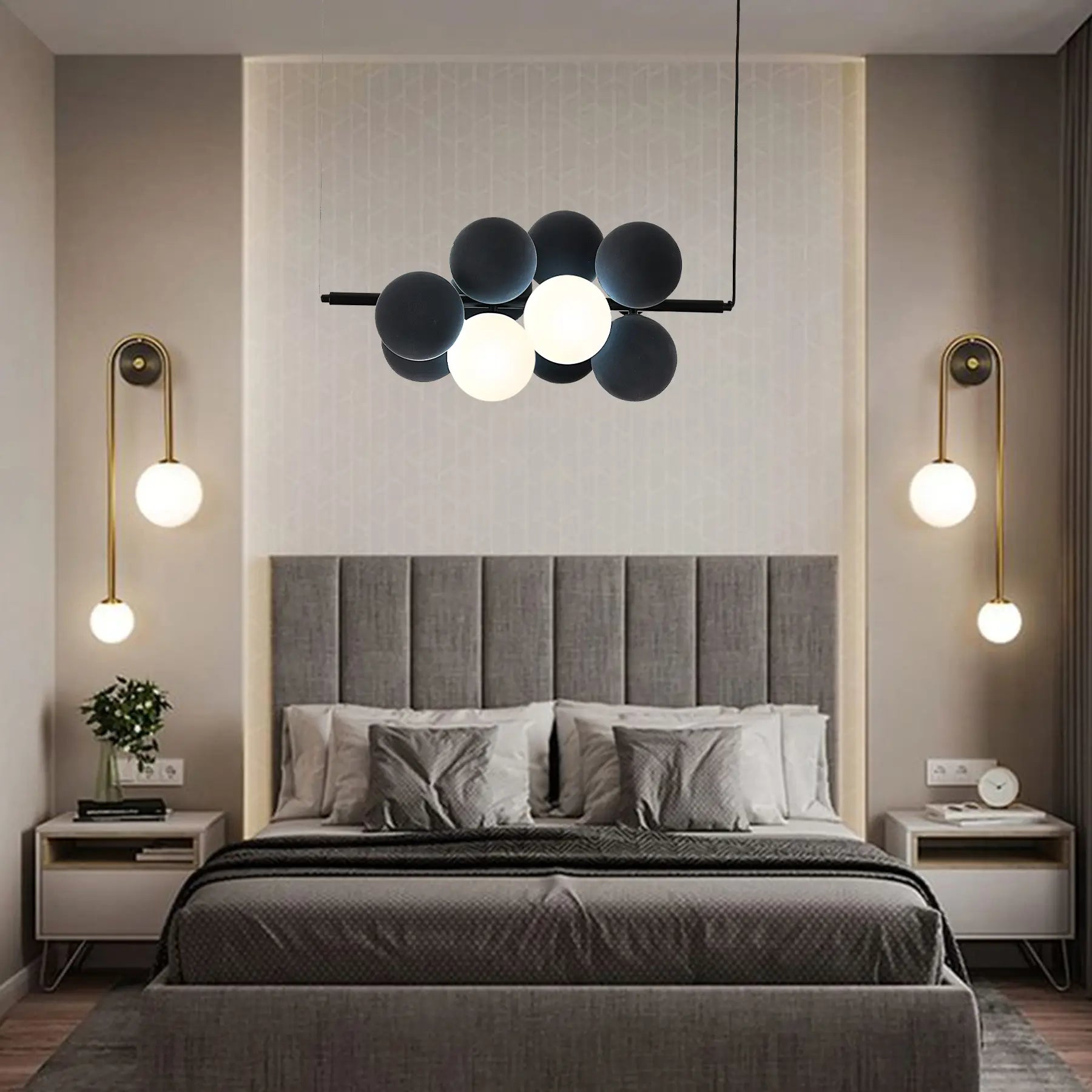 Name Abeeha Celestial Orb Pendant Light in midnight black and white, featuring a modern 10-bulb design with spherical globes on a black metal frame, illuminating a stylish dining room.